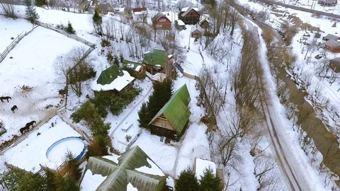 Aerial drone view flight over ski resort village in winter sunset time valley 스톡 동영상 105267295