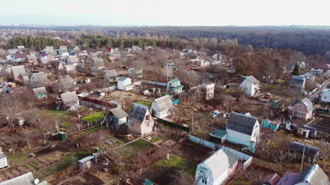 Aerial Drone View Flight Over small brick houses with plot of land in the middle Stock Footage 171788011