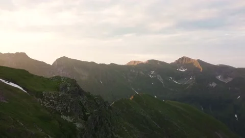 Aerial Drone View Flight over Mountain at sunset Stock Footage 209990174