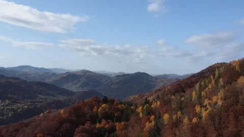 Aerial drone view of flight over mountains against in countryside at autumn Stock Footage 292254782