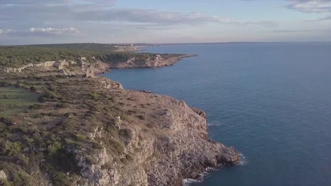 Aerial Drone View Fly Off Cliffs Of Italy on sunset Video stock 84037851