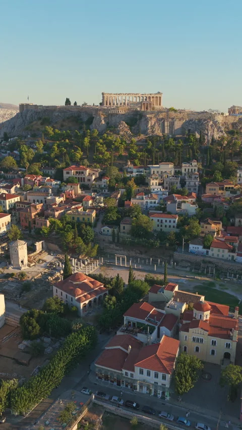 Aerial drone view flying above Athens Greece towards the Acropolis Stock Footage 346107251