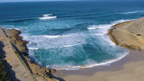 Aerial drone view flying over large waves and surf on beach with INSPIRE 2 Stock Footage 101562164