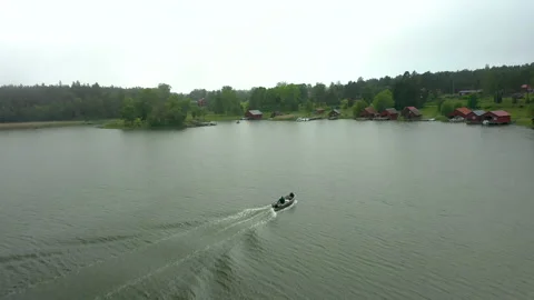 Aerial drone view flying over people in leisure boat Stock Footage 159269892