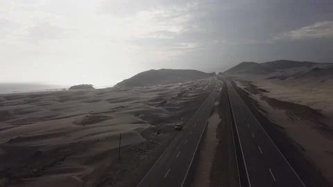 Aerial drone view flying over a beautiful colored virgin sandbank in the desert 库存影片 197573905