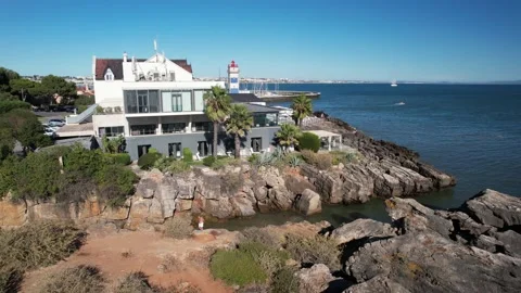 Aerial drone view flying over Hotel Farol in Cascais, Portugal Stock Footage 209135071
