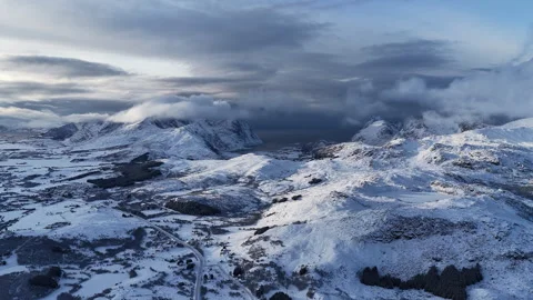 Aerial drone view flying over snowy winter mountains, Norway 스톡 동영상 343108744