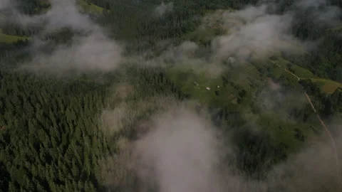 Aerial drone view of flying in rainbow during morning fog in mountains Stock Footage 159676799