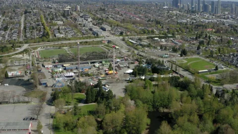Aerial drone view flying toward Playland Amusement Park in Vancouver. Stock Footage 154691284