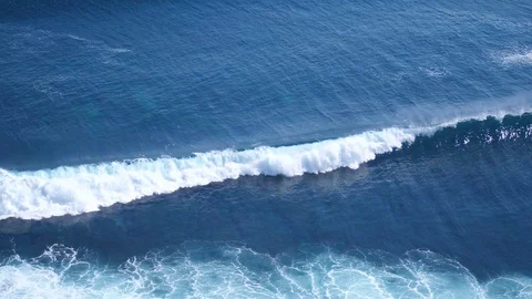 Aerial drone view of foaming waves in ocean. slow motion. 3840x2160 Stock Footage 92779865