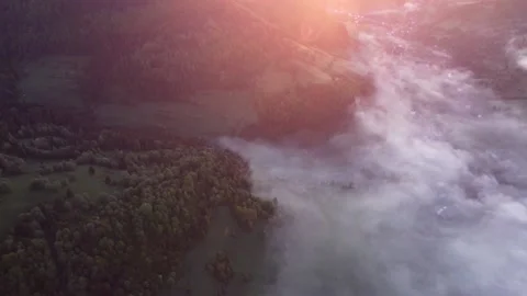 Aerial drone view of fog ,inversion clouds in a rural valley above the village Video stock 196164852