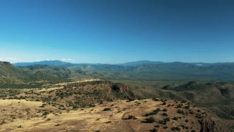 Aerial drone view of forests and cliffs at Theodor Roosevelt lake overlook in Video stock 143197347