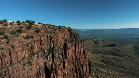 Aerial drone view of forests and cliffs at Theodor Roosevelt lake overlook in Video stock 143199518