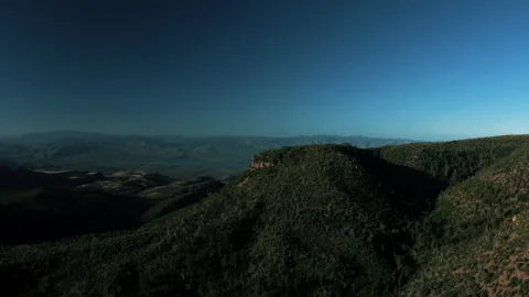 Aerial drone view of forests and cliffs at Theodor Roosevelt lake overlook in Stock-Footage 143208699
