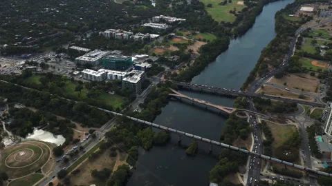 Aerial Drone View of Freight Train Crossing Mopac Railroad Bridge Over Lad.. Video stock 328160331