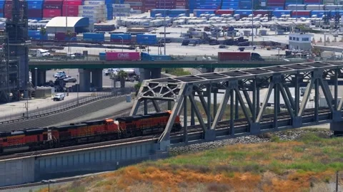 Aerial Drone View Freight Train Railroad Bridge  4K Editorial Stock Footage 335552492