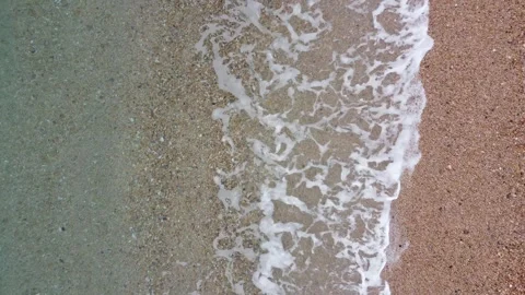 Aerial Drone View of Gentle Waves on Start Bay Pebbly Beach in Devon Stock Footage 295366845