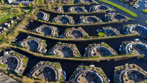 Aerial drone view geometric pattern of water houses, marina, yachts Marina .. Stock Photos