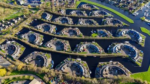 Aerial drone view geometric pattern of water houses, marina, yachts Marina .. Stock Photos