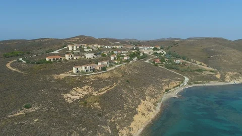 Aerial drone view of Ghost town at the sea coast in Limnos, Greece Stock Footage 115729609
