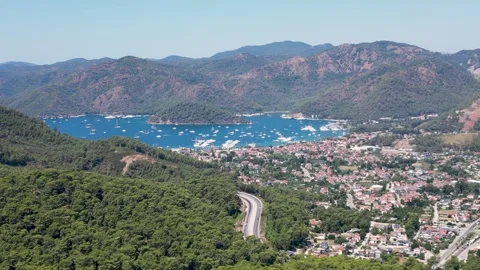 Aerial drone view of Göcek bay, town, and luxury yachts in Fethiye, Turkey Vídeos de archivo 340024997