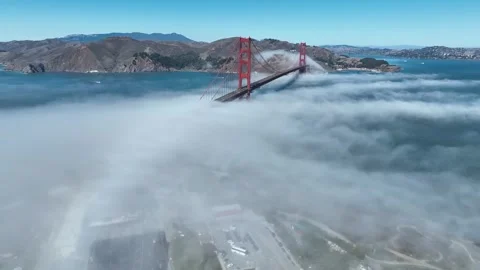 Aerial Drone View of Golden Gate Bridge Rising Above Low Fog Stock Footage 336759928