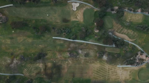 Aerial drone view of a golf course with green fairways Video stock 342574989