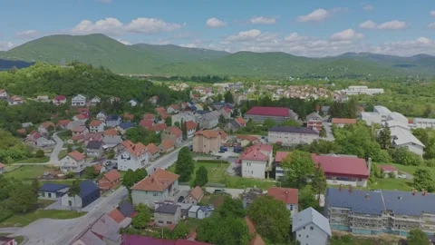 Aerial drone view of Gračac town surrounded by green mountains in Croatia 動画素材 335160149