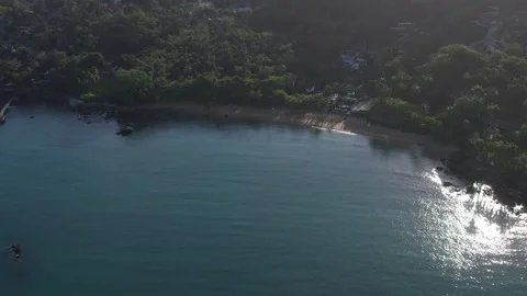 Aerial Drone View of Green Forest and Turquoise Sea in Ilhabela, Brazil Stock Footage 321775903