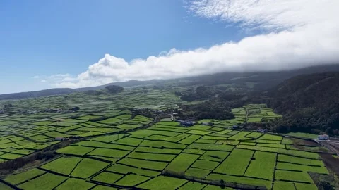 Aerial Drone View Of Green Patchwork Farmland Under Clouds On Terceira Island Stock-Footage 336288124