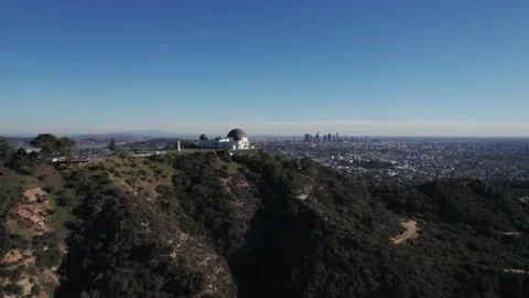 Aerial drone view of Griffith Observatory, Beautiful sky during Sunset Stock Footage 168543829