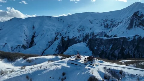 Aerial drone view of Gudauri ski resort in winter. Caucasus mountains in Ge.. Video stock 309922889