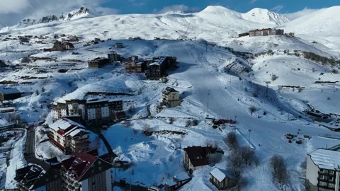 Aerial drone view of Gudauri ski resort in winter. Caucasus mountains in Ge.. Video stock 309923390