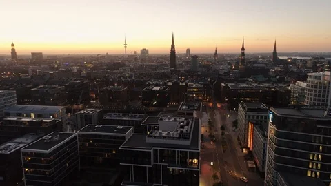 Aerial drone view of Hamburg Hafencity and harbor at sunset. Modern buildings. Stock Footage