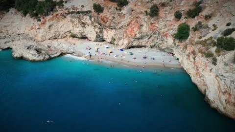 Aerial Drone View of Hidden Turquoise Beach Cove, Fethiye Turkey Stock Footage 342393442