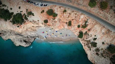 Aerial Drone View of Hidden Turquoise Beach Cove, Fethiye Turkey Видео 342393443
