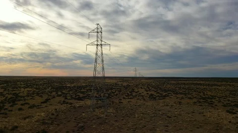 Aerial drone view of high voltage electricity and power lines at the sunset Stock Footage 105877863