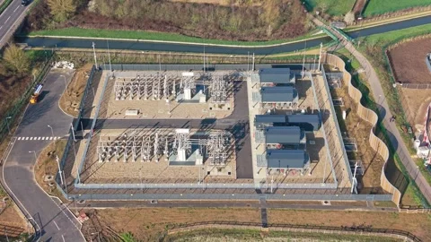 Aerial Drone View of High Voltage Power Transformer at Electrical Substation Vídeo Stock 330131167