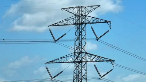 Aerial drone view of a high-voltage transmission tower. Stockbeeldmateriaal 339403717