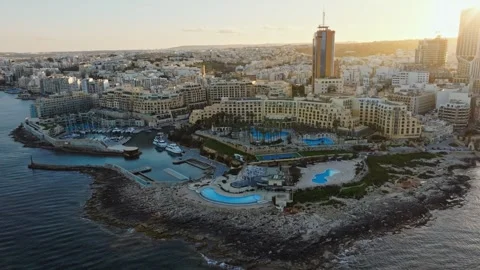 Aerial drone view of highest and modern building of Malta. St. Julian's city Stock Footage 268230330