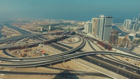 Aerial drone view of Highway car traffic interchange near Dubai Marina Vídeos de archivo 100856366