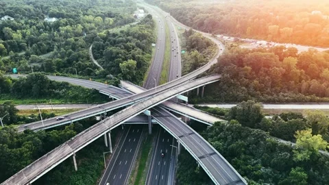 Aerial drone view of a highway interchange with curved overpasses... Video stock 340657950