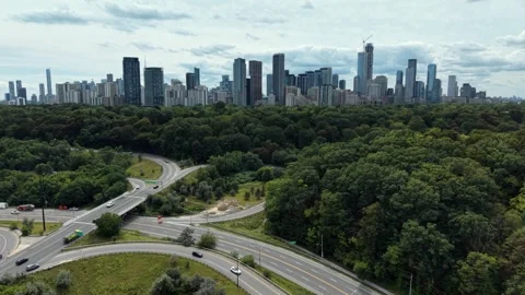 Aerial Drone View of Highway Interchange With Toronto Skyline Behind Vídeos de archivo 345835185