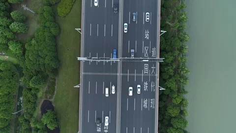 Aerial drone view of highway multi-level junction road with moving cars at Video stock 111235372