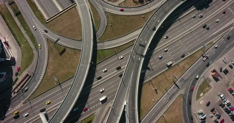 Aerial drone view of highway multi-level junction road with moving cars Stock Footage 130857568