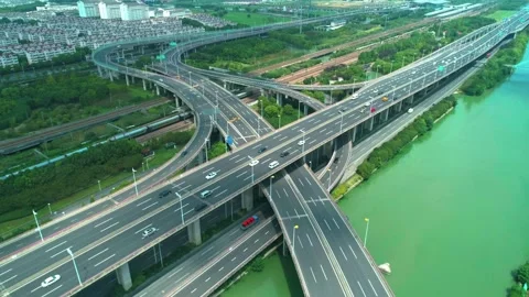 Aerial drone view of highway multi-level junction road with moving cars at Stock Footage 152877582