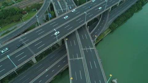 Aerial drone view of highway multi-level junction road with moving cars at Video stock 152877862