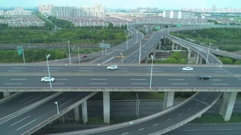 Aerial drone view of highway multi-level junction road with moving cars at Video stock 152878724