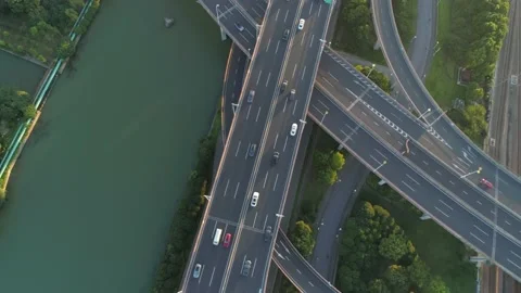 Aerial drone view of highway multi-level junction road with moving cars at Video stock 152973115