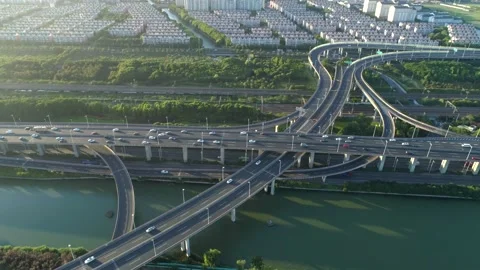 Aerial drone view of highway multi-level junction road with moving cars at Video stock 152973201
